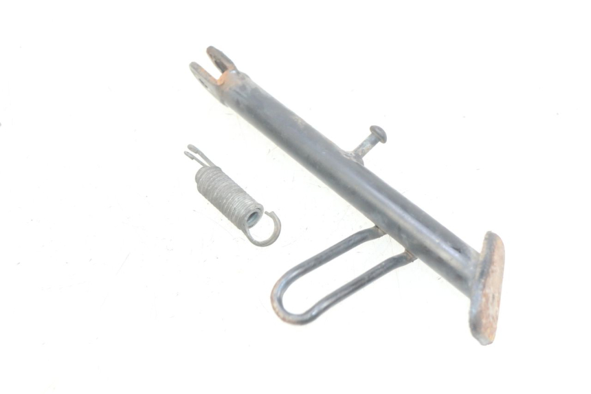 photo de PATA LATERAL SYM CROX 4T 50 (2016 - 2023) - Detalle de la pieza