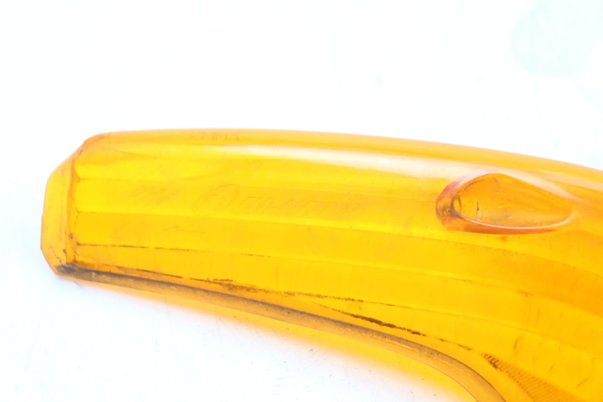 photo de TRASERO IZQUIERDO LENTE INTERMITENTE HONDA NES AROBASE 125 (2000 - 2003) - Detalle de la pieza