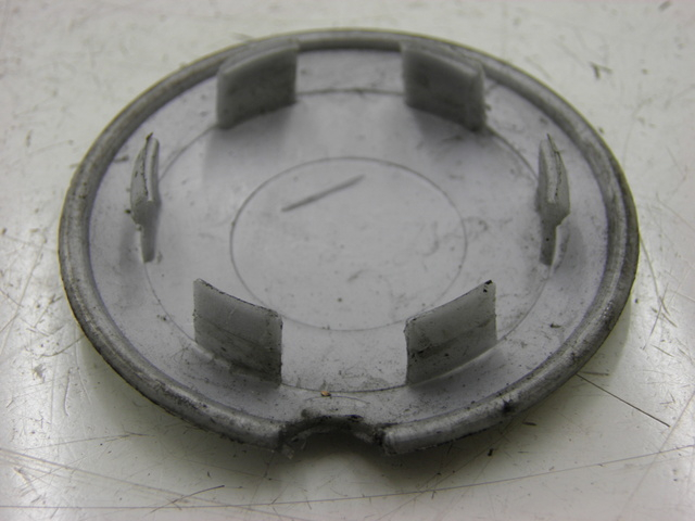 photo de TAPA RUEDA APRILIA SCARABEO 100 (2003 - 2012) - Detalle de la pieza