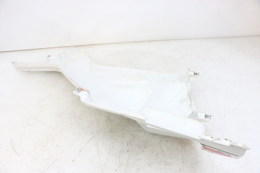 photo de TAPA DEBAJO DEL ASIENTO DERECHO HYTRACK ST 170 (2020 - 2024) - Detalle de la pieza