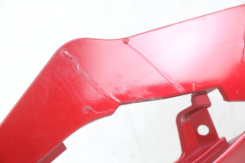 photo de TAPA DEBAJO DEL ASIENTO IZQUIERDO SYM FIDDLE 3 III 125 (2014 - 2020) - Detalle de la pieza