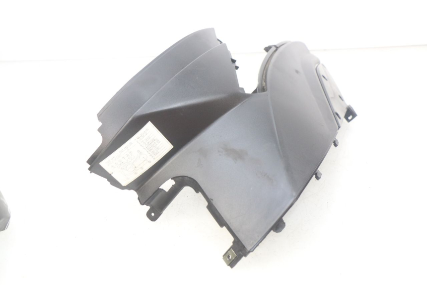 photo de TAPA DEBAJO DEL ASIENTO IZQUIERDO TNT MOTOR GRIDO 2T 50 (2010 - 2019) - Recambio usado revisado