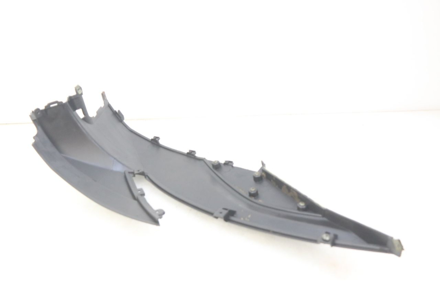 photo de TAPA DEBAJO DEL ASIENTO IZQUIERDO TNT MOTOR GRIDO 2T 50 (2010 - 2019) - Detalle de la pieza