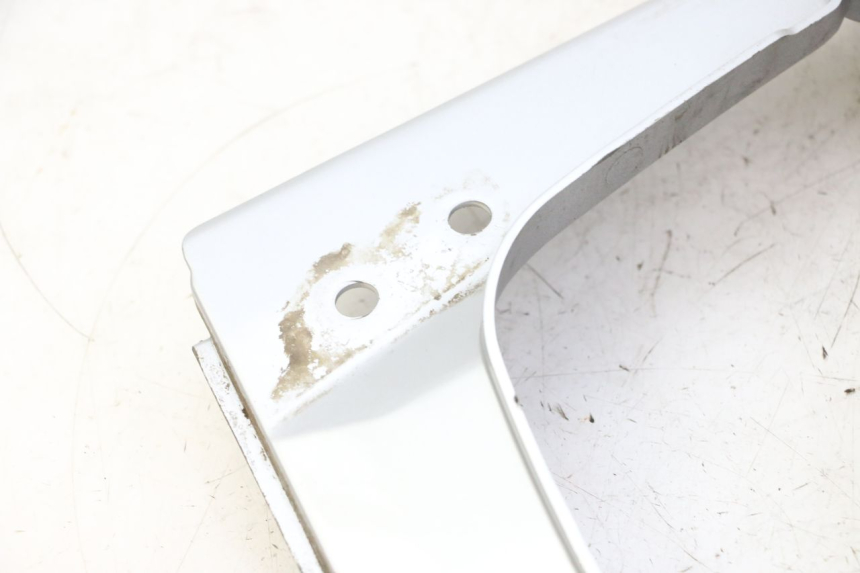 photo de TAPA BAJO ASIENTO IZQUIERDA DAELIM HISTORY 125 (2001 - 2002) - Marcados y referencias originales