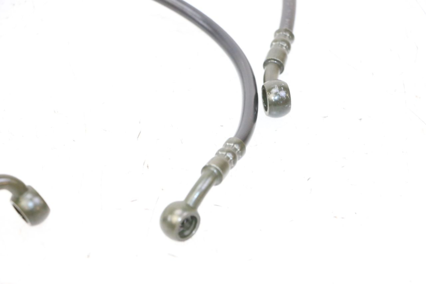 photo de MANGUERA DE FRENO DELANTERO Y TRASERO APOLLO RFZ 125 - Detalles de los puntos de fijación