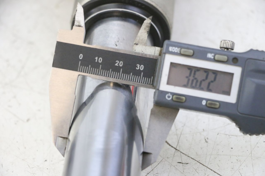 photo de BOTELLA HORQUILLA  PEUGEOT ELYSTAR 125 (2002 - 2007) - Detalle de la pieza