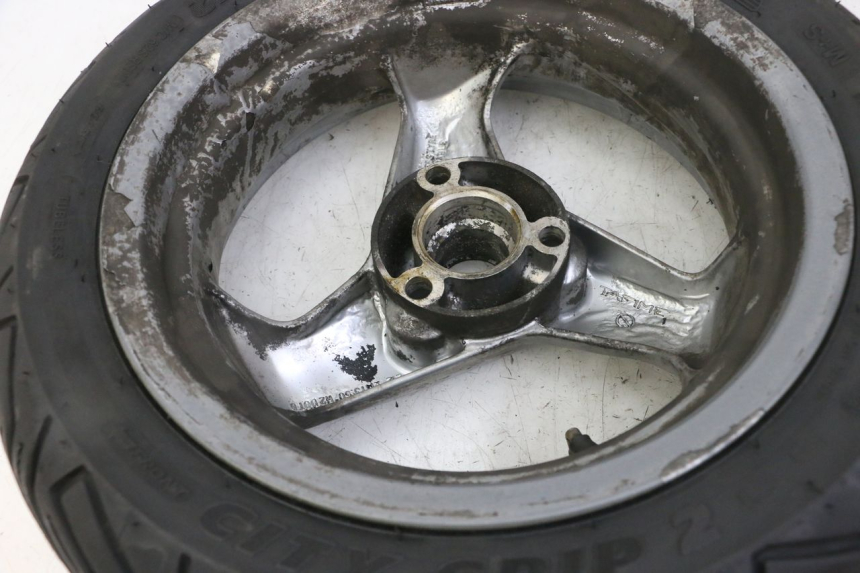 photo de LLANTA TRASERA Y NEUMÁTICO PEUGEOT ELYSTAR 125 (2002 - 2007) - Estado de la superficie y material