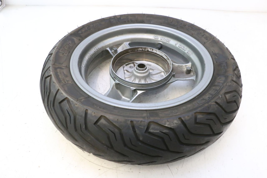 photo de LLANTA TRASERA Y NEUMÁTICO KYMCO MOVIE S 125 (2009 - 2018) - Marcados y referencias originales