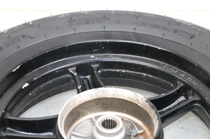 photo de Llanta trasera DAELIM A-FOUR 2T 50 (2005 - 2012) - Primer plano técnico