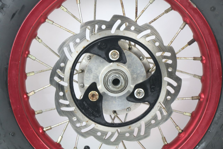 photo de LLANTA DELANTERA  THUMP DIRT BIKE 120 - Inspección visual detallada