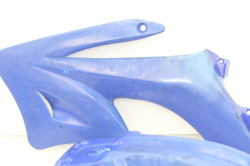 photo de JUNTA DE CARENAJE DELANTERO LONCIN DIRT BIKE 125 - Estado de la superficie y material