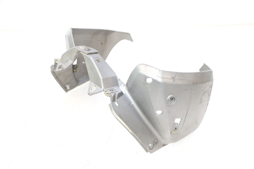 photo de JUNTA CARENAJE DELANTERO INF. PEUGEOT TREKKER 50 (1995 - 2004) - Estado de la superficie y material