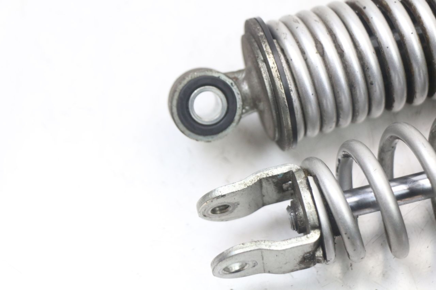 photo de PAR AMORTIGUADOR TRASERO HONDA PCX (JF28) 125 (2009 - 2011) - Primer plano técnico