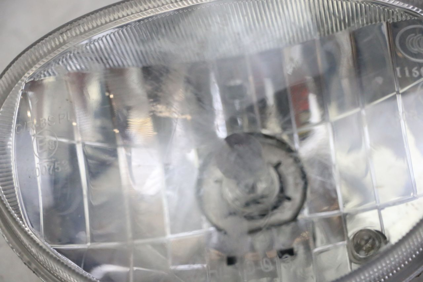 photo de FARO DELANTERO DAELIM BESBI 125 (2007 - 2008) - Zoom sobre los componentes