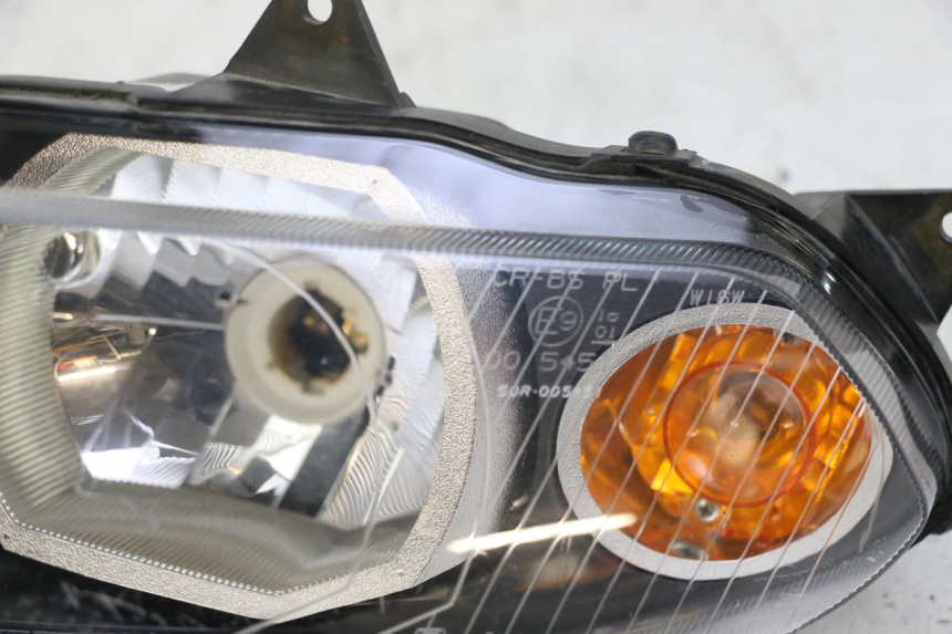 photo de FARO DELANTERO IZQUIERDA YAMAHA TZR 50 (2008 - 2016) - Estado de la superficie y material