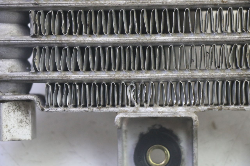 photo de RADIADOR DE ACEITE DAELIM VJ ROADWIN FI 125 (2008 - 2017) - Recambio usado revisado