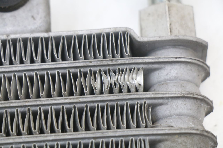 photo de RADIADOR ACEITE HYOSUNG XRX 125 (2000 - 2008) - Primer plano técnico