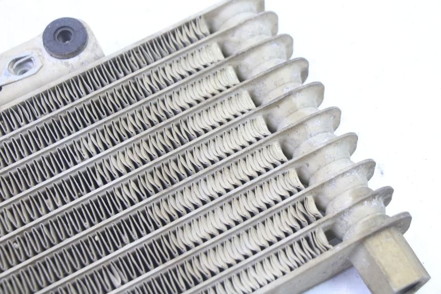 photo de RADIADOR ACEITE YAMAHA YFM BRUIN 350 (2003 - 2009) - Estado de la superficie y material